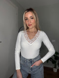 Body con pizzo